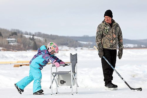 10032023
Five-year-old Claire Dagg ice skates on Minnedosa Lake with her grandfather Tom Instance on a mild Friday. (Tim Smith/The Brandon Sun)