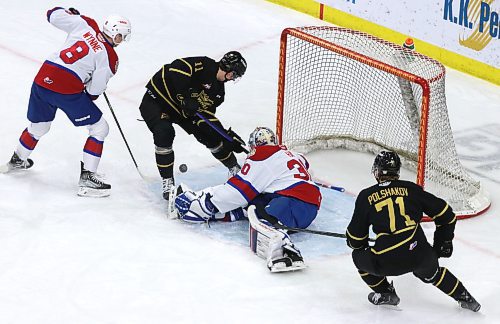Brandon Wheat Kings forward Rylen Roersma (11) gets his stick on the puck to score the first of his two goals on Edmonton Oil Kings goalie Kolby Hay (30) as Edmonton defenceman Braeden Wynne (8) and Brandon forward Zakhar Polshakov (71) look on during Western Hockey League action at Westoba Place on Saturday. Hay made a pad save. (Perry Bergson/The Brandon Sun)