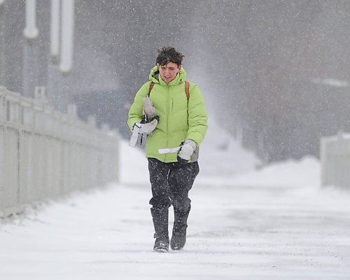 RUTH BONNEVILLE / WINNIPEG FREE PRESS 

Weather Standup - Blowing snow

Parker Koepnick walks across the Esplanade Riel Bridge against blowing snow from the Forks Saturday. 

March 11th, 2023

