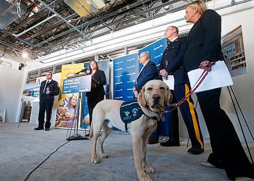 JOHN WOODS / WINNIPEG FREE PRESS
Duke, the therapy dog, stands by as, from left, Chief Danny Smyth, Winnipeg Police Service, Premier Heather Stefanson, Justice Minister Kelvin Goertzen, Supt. Rob Lasson, officer in charge of major crime services, RCMP, and Christy Dzikowicz, executive director, Toba Centre, were on hand to announce funding for Manitoba violent crime strategy and supports for children and families at the new Toba Centre in Assiniboine Park Sunday, March 12, 2023. 

Re: May