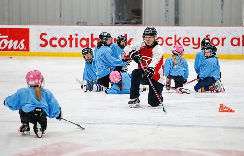 JOHN WOODS / WINNIPEG FREE PRESS
Cassie Campbell coaches a young player how to get up after she fall at Girls Hockeyfest at Hockey For All Centre Sunday, March 12, 2023. 

Re: ?