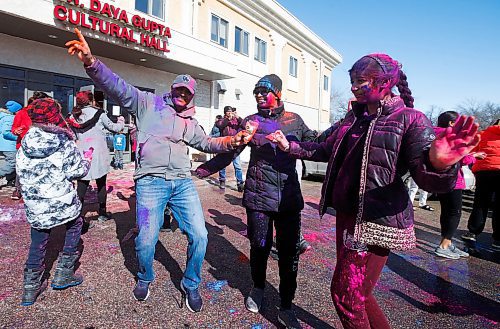 JOHN WOODS / WINNIPEG FREE PRESS
Arpit Pandey, from left, his partner Manisha and their daughter Rajiv, celebrate with friends at Holi festivities at the Hindu Temple on St Anne&#x2019;s Road Sunday, March 12, 2023. 

Re: ?