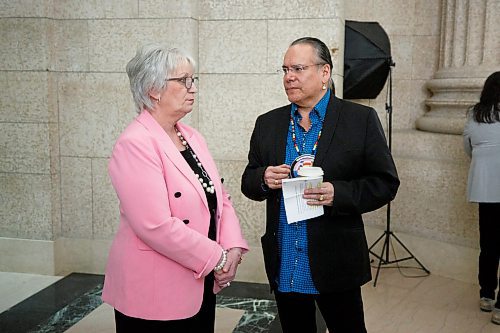 MIKE DEAL / WINNIPEG FREE PRESS
MKO Grand Chief Garrison Settee chats with Indigenous Reconciliation and Northern Relations Minister Eileen Clarke prior to the announcement of a new agreement that will help in the search for children who never returned home from residential schools at the Manitoba Legislative building Monday morning.
230313 - Monday, March 13, 2023.