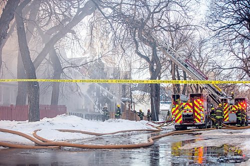 MIKAELA MACKENZIE / WINNIPEG FREE PRESS

Firefighters battle a house fire on Spence Street, just south of Sargent Avenue, in Winnipeg on Tuesday, March 14, 2023. Standup.

Winnipeg Free Press 2023.