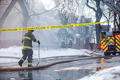 MIKAELA MACKENZIE / WINNIPEG FREE PRESS

Firefighters battle a house fire on Spence Street, just south of Sargent Avenue, in Winnipeg on Tuesday, March 14, 2023. Standup.

Winnipeg Free Press 2023.