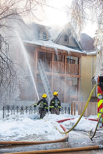 MIKAELA MACKENZIE / WINNIPEG FREE PRESS

Firefighters battle a house fire on Spence Street, just south of Sargent Avenue, in Winnipeg on Tuesday, March 14, 2023. Standup.

Winnipeg Free Press 2023.