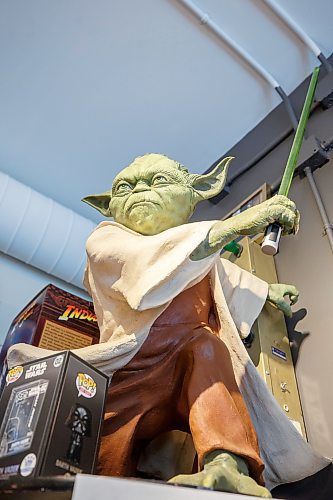 MIKE DEAL / WINNIPEG FREE PRESS
A full-scale statue of Yoda at Hollywood Toy & Poster Company. In 2000, David landed his dream job, a 12-month term as curator for Rancho Obi-Wan, a non-profit museum in California that houses the world’s largest collection of Star Wars memorabilia.