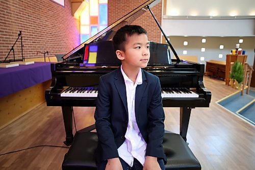 Pianist Darwin Chen at the piano before performing in the Junior and Intermediate Piano category of the Brandon Festival of the Arts at Knox United Church on March 3. (Tim Smith/The Brandon Sun)