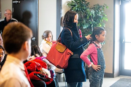 MIKAELA MACKENZIE / WINNIPEG FREE PRESS

Sophie Liu (nine) gets her hair braided by her mom, Jing Sun, before performing a piano solo in the Winnipeg Music Festival at Sterling Mennonite Fellowship in Winnipeg on Thursday, March 16, 2023. For Ѡstory.

Winnipeg Free Press 2023.