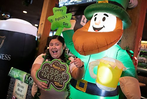 Kim Tan, who is the marketing director at the Thirsty Lion Tavern at 525 Dale Blvd., in Winnipeg, Man., shows her excitement for the St. Patrick's Day bash, which gets underway at the local tavern at 7 p.m. March 17, 2023. (Brook Jones / Winnipeg Free Press)