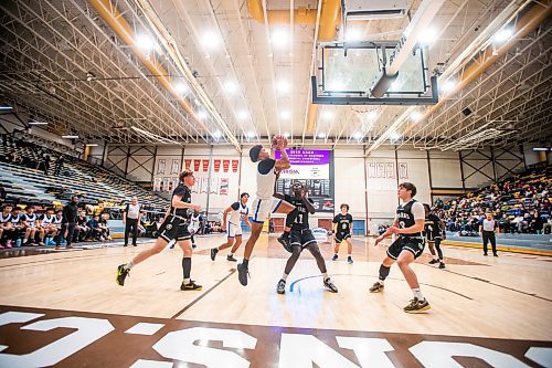 MIKAELA MACKENZIE / WINNIPEG FREE PRESS

Sturgeon Heights Husky Carlos Silva (6) tries for a shot in a game against the Vincent Massey Trojans in the boy's AAAA provincial semi-finals at Investors Group Athletic Centre in Winnipeg on Thursday, March 16, 2023. For Josh story.

Winnipeg Free Press 2023.