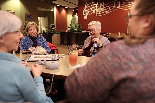15032023
Wendy Brownlie, Karen Webb, Mona Koroscil and Karlie Mymryk socialize while knitting with friends at Tavern United in the Canad Inns Hotel in Brandon on Wednesday evening. 
(Tim Smith/The Brandon Sun)