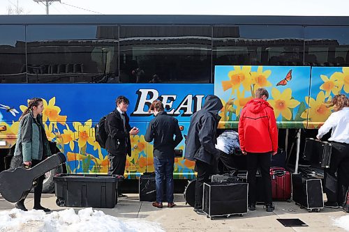 17032023
Musicians from Glenlawn Collegiate load up their bus after performing during the Brandon University Jazz Festival at the Western Manitoba Centennial Auditorium on Friday. The three day festival, the first since 2019 due to the COVID-19 pandemic, brought in school bands from across the province for performances and workshops throughout the WMCA and Brandon University. The festival wraps up today. 
(Tim Smith/The Brandon Sun)