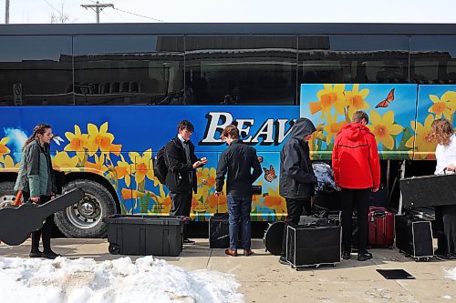 17032023
Musicians from Glenlawn Collegiate load up their bus after performing during the Brandon University Jazz Festival at the Western Manitoba Centennial Auditorium on Friday. The three day festival, the first since 2019 due to the COVID-19 pandemic, brought in school bands from across the province for performances and workshops throughout the WMCA and Brandon University. The festival wraps up today. 
(Tim Smith/The Brandon Sun)