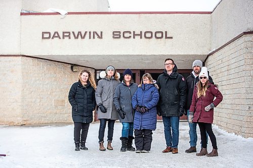 MIKAELA MACKENZIE / WINNIPEG FREE PRESS


Lindsey Kinsley (left), Susan Mortimer, Melissa Martin, Karen Helbig, Justin Stanus, Brett Meade, and Chantal Gendron, a group of parents upset about proposal to turn Darwin School (currently kindergarten to grade eight) into only a grade five to eight school, pose for a photo in front of the school in Winnipeg on Friday, March 17, 2023. For &#x460;story.

Winnipeg Free Press 2023.