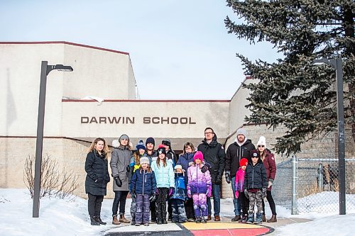 MIKAELA MACKENZIE / WINNIPEG FREE PRESS


Lindsey Kinsley (left), Susan Mortimer, Clark Martin (13), Audrey Martin (seven), Melissa Martin, Stella Martin (nine), Walter Martin (11), Owen Helbig (six), Karen Helbig, Lexie Helbig (nine), Justin Stanus, Brett Meade, Madelyn Meade (seven), Brayden Meade (nine), and Chantal Gendron, a group of parents and students upset about proposal to turn Darwin School (currently kindergarten to grade eight) into only a grade five to eight school, pose for a photo in front of the school in Winnipeg on Friday, March 17, 2023. For &#x460;story.

Winnipeg Free Press 2023.