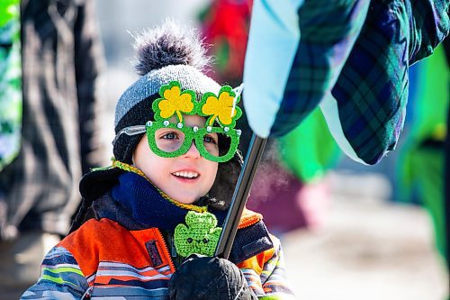 MIKAELA MACKENZIE / WINNIPEG FREE PRESS

Charlie Donahue (five) takes part in the St. Patrickճ Day parade on Portage Avenue in Winnipeg on Saturday, March 18, 2023. Standup.

Winnipeg Free Press 2023.