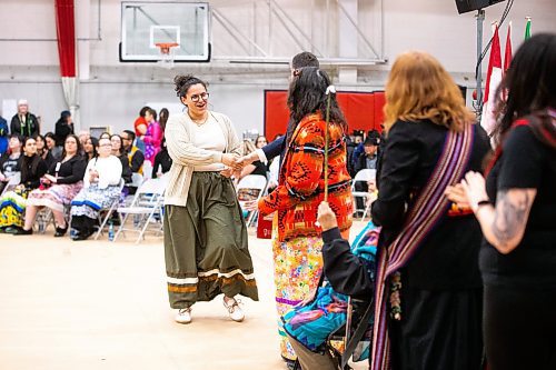 MIKAELA MACKENZIE / WINNIPEG FREE PRESS

Athena Le Fort-Lynx, bachelor of criminal justice graduate, shakes hands with U of W president Todd Mondor at the U of W graduation Pow Wow at the Duckworth Centre in Winnipeg on Saturday, March 18, 2023. For Tyler story.

Winnipeg Free Press 2023.