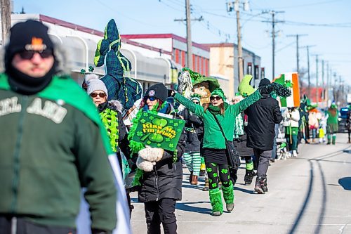 MIKAELA MACKENZIE / WINNIPEG FREE PRESS

Gabrielle Head waves green pom poms while taking part in the St. Patrick&#x573; Day parade in Winnipeg on Saturday, March 18, 2023. Standup.

Winnipeg Free Press 2023.