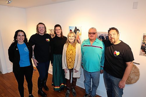The team behind a new photo exhibit titled "A Warrior’s Red Road" pose for a group photo at the Glen P. Sutherland Gallery of Art on Sunday afternoon. The team consists of, from left to right, Stephanie Spence (researcher), Candice Waddell-Henowitch (researcher), Rachel Herron (researcher), Chris Reid (gallery curator), Frank Tacan (elder) and Jason Gobeil (Akicita Cante Waste men’s group representative). Missing from this photo are researchers Marti Ford and Jonathan Allen. See story on Page A3. (Kyle Darbyson/The Brandon Sun)