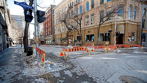 JOHN WOODS / WINNIPEG FREE PRESS
Construction barriers placed at McDermot and Albert Sunday, March 19, 2023. Some businesses complained that they weren&#x574; given any warning about the construction.

Re: kitching