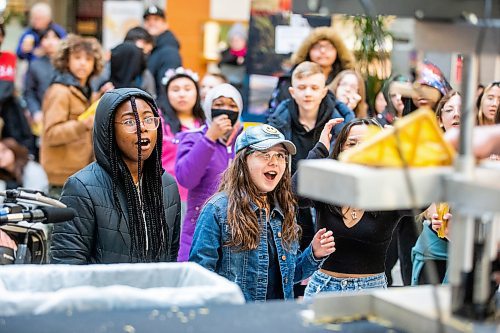 MIKAELA MACKENZIE / WINNIPEG FREE PRESS

Goodness Biyer (left), Alaina Sawatzky, and Kenniah Pores, grade seven students at Salisbury-Morse Place School, watch as their teamճ bridge gets tested (and maxes out at a whopping 34.6kg) at the Spaghetti Bridge Competition at Kildonan Place Mall in Winnipeg on Monday, March 20, 2023. Over 800 kindergarten to grade 12 students are taking part in the competition, which raises money for Harvest Manitoba (Engineers Geoscientists Manitoba donate based on the strength of the entries). Standup.

Winnipeg Free Press 2023.