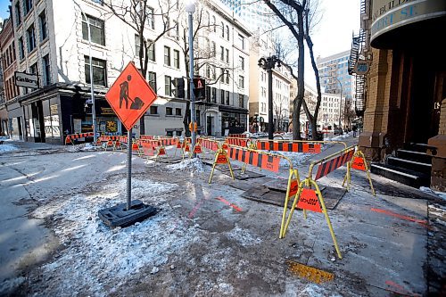 JOHN WOODS / WINNIPEG FREE PRESS
Construction barriers placed at McDermot and Albert Sunday, March 19, 2023. Some businesses complained that they weren&#x574; given any warning about the construction.

Re: kitching