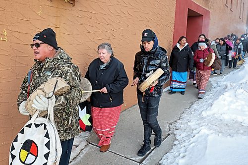 Brandon Friendship Centre elder and knowledge keeper Frank Tacan, BFC '60s Scoop co-ordinator Debbie Huntinghawk and Sam Jackson drum and sing as they lead a march along Ninth Street in downtown Brandon during the Smudging Our Streets and Community Feast event organized for the spring equinox by the John Howard Society of Brandon Men's Resource Centre. (Tim Smith/The Brandon Sun)