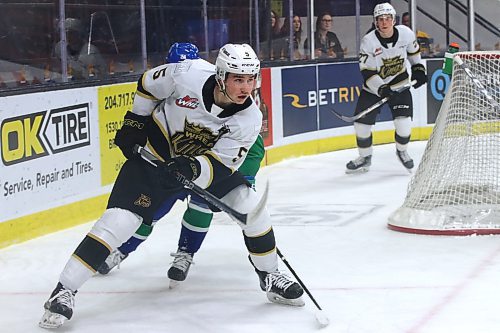 Brandon Wheat Kings defenceman Logen Hammett (5) pursues the puck during a Western Hockey League game against the Swift Current Broncos earlier this season at Westoba Place as his partner Luke Shipley (27) watches in the background. (Perry Bergson/The Brandon Sun)