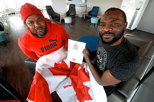 JOHN WOODS / WINNIPEG FREE PRESS
Razak Iyal, left, and Seidu Mohammed, who are from Ghana and nearly died when they crossed the boarder in the winter of 2016, are photographed at there apartment block in Winnipeg on Monday, March 20, 2023. Iyal and Mohammed recently received their Canadian citizenship.