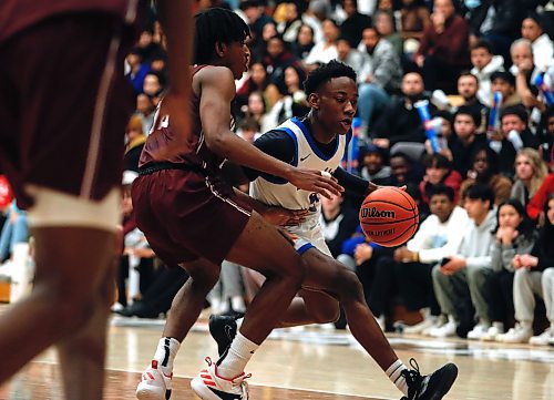 JOHN WOODS / WINNIPEG FREE PRESS
St Paul&#x2019;s Crusaders&#x2019; Giovanni Ajiamah (10) defends against Sturgeon Heights Huskies&#x2019; Samuel Sola (5) in the Manitoba High School 2023 AAAA Provincial Basketball Championship at the University of Manitoba Monday, March 20, 2023. 