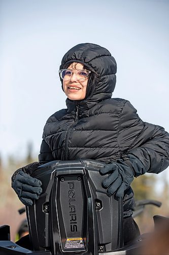 MIKAELA MACKENZIE / WINNIPEG FREE PRESS

Grade eight student Harveil Cook watches from a snowmobile as other students also get sled rides on Bloodvein First Nation on Wednesday, March 8, 2023. For Maggie Macintosh story.

Winnipeg Free Press 2023.