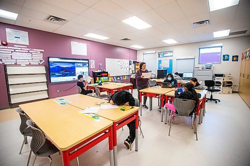 MIKAELA MACKENZIE / WINNIPEG FREE PRESS

Grade six teacher Lina Whiteway hands out a St. Patrick&#x573; Day activity at Bloodvein River School on Bloodvein First Nation on Wednesday, March 8, 2023. For Maggie Macintosh story.

Winnipeg Free Press 2023.