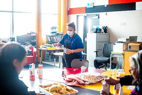 MIKAELA MACKENZIE / WINNIPEG FREE PRESS

Doris Monkman, school cook, serves elders food at Bloodvein River School on Bloodvein First Nation on Thursday, March 9, 2023. For Maggie Macintosh story.

Winnipeg Free Press 2023.