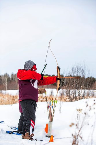 MIKAELA MACKENZIE / WINNIPEG FREE PRESS

Hughie Goosehead shoots an arrow in the archery portion of the snowshoe races (a land-based part of the winter carnival festivities at Bloodvein River School) on Bloodvein First Nation on Thursday, March 9, 2023. For Maggie Macintosh story.

Winnipeg Free Press 2023.