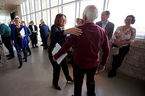 MIKE DEAL / WINNIPEG FREE PRESS
Premier Heather Stefanson greets Dale Kendel, who is the former chair of the Vulnerable Persons Living with a Mental Disability Task Force during an announcement at the CMHR Tuesday morning that the government will be investing $104 million to support disability services and increase the wages of staff that deliver them.
See Carol Sanders story
230321 - Tuesday, March 21, 2023.