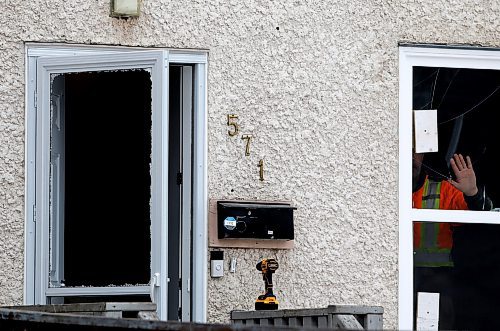 JOHN WOODS / WINNIPEG FREE PRESS
A worker does repairs where bullet holes mark 571 Langside which was shot at earlier on Tuesday, March 21, 2023. 

Re: Searle