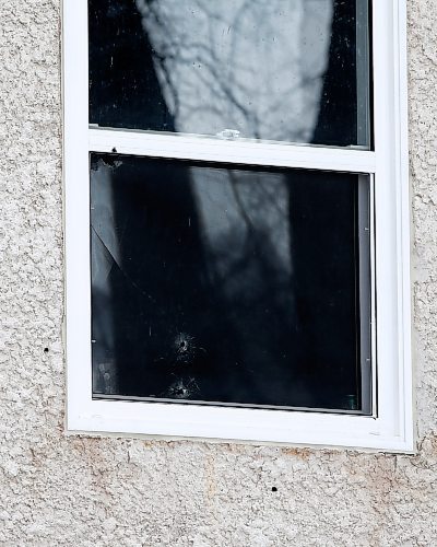 JOHN WOODS / WINNIPEG FREE PRESS
Bullet holes mark 571 Langside which was shot at earlier on Tuesday, March 21, 2023. 

Re: Searle