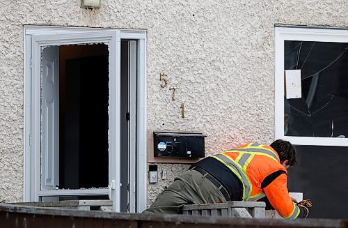 JOHN WOODS / WINNIPEG FREE PRESS
A worker does repairs where bullet holes mark 571 Langside which was shot at earlier on Tuesday, March 21, 2023. 

Re: Searle