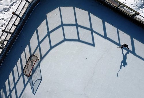 22032023
Andre Pashe casts a shadow as he practices his shots on net at the Central Community Club rink on a sunny Wednesday afternoon. 
(Tim Smith/The Brandon Sun)default