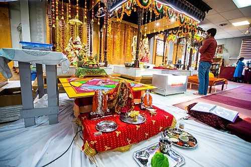 MIKAELA MACKENZIE / WINNIPEG FREE PRESS

Rakesh Chukka pays obeisance at the Hindu Temple before the Navratri evening celebration in Winnipeg on Wednesday, March 22, 2023. 
For Romona Goomansingh story.

Winnipeg Free Press 2023.