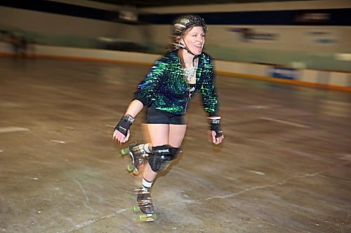 Sarah Jane Maynard smiles as she roller-skates during Roller Disco at the Sportsplex Arena on Thursday evening. (Tim Smith/The Brandon Sun)