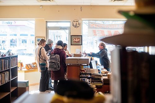 MIKAELA MACKENZIE / WINNIPEG FREE PRESS

Gary Nerman helps customers at Nerman&#x573; Books and Collectibles, which is closing down this Saturday after 30 years, in Winnipeg on Thursday, March 23, 2023. For Ben Waldman story.

Winnipeg Free Press 2023.