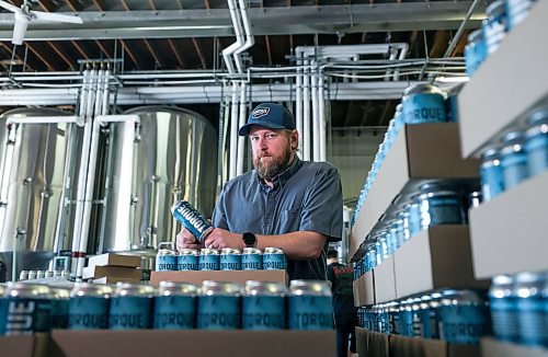 RUTH BONNEVILLE / WINNIPEG FREE PRESS 

Biz- Beer Tax

Matt Wolff, Torque Brewing's operations manager with stacks of Torque beer Friday.   Breweries are being hit by a federal tax increase on the processing side of their business.  

March 23rd, 2023