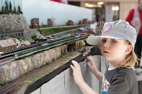 BROOK JONES / WINNIPEG FREE PRESS
Five-year-old Forest Humphreys checks out the N scale model train and railway layout set up by the WinNtrak Model Railroad Club of Winnipeg at Grant Park Shopping Centre in Winnipeg, Man., Saturday, March 25,. 2023. 