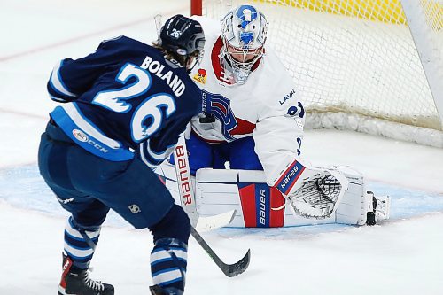 JOHN WOODS / WINNIPEG FREE PRESS
Manitoba Moose Tyler Boland&#x2019;s (26) shot is saved by Laval Rocket&#x2019;s goaltender Cayden Primeau (31) during first period AHL action in Winnipeg on Sunday, March 26, 2023.

Reporter: ?