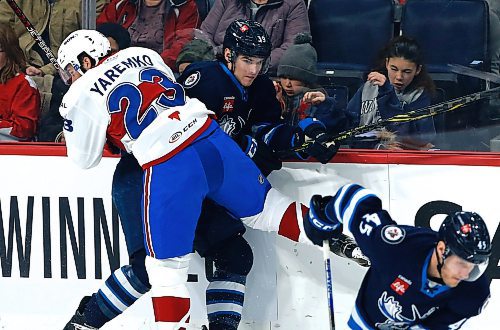 JOHN WOODS / WINNIPEG FREE PRESS
Fans react as Manitoba Moose Jeff Malott (39) gets hit by Laval Rocket&#x2019;s Nolan Yaremko (23) during first period AHL action in Winnipeg on Sunday, March 26, 2023.

Reporter: ?