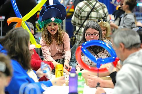 Royal Manitoba Winter Fair attendees enjoy some lunch at the Keystone Centre's Manitoba Room during the opening day of this year's week-long event. (Kyle Darbyson/The Brandon Sun)