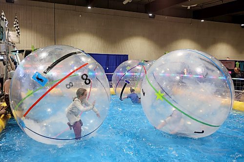 27032023
Children play in Water Balls during the opening day of the Royal Manitoba Winter Fair at The Keystone Centre on Monday.
(Tim Smith/The Brandon Sun)
