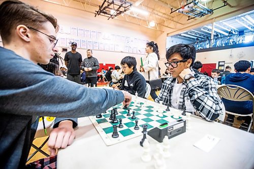 MIKAELA MACKENZIE / WINNIPEG FREE PRESS

Yaroslav Kolesnykov, gr. 10 student from the Ukraine now attending Kelvin (left), and Samuel Daya, gr. 11 student and leader of the Sisler chess club, play against each other in the Manitoba high school chess championship at Sisler High School in Winnipeg on Tuesday, March 28, 2023. Over 60 students participated in the event. For Tyler story.

Winnipeg Free Press 2023.